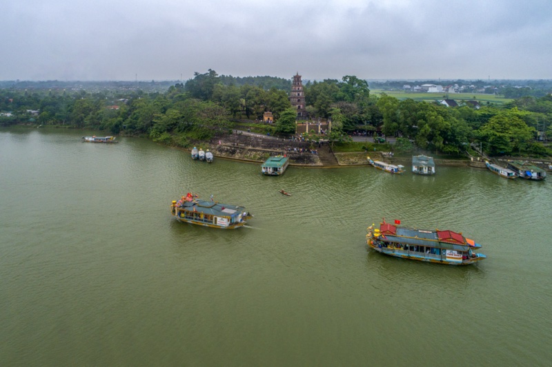 Hon Chen Temple: Where Legends Come to Life 4 Aerial view of the Hon Chen Temple during the festival along the Huong River, Hue